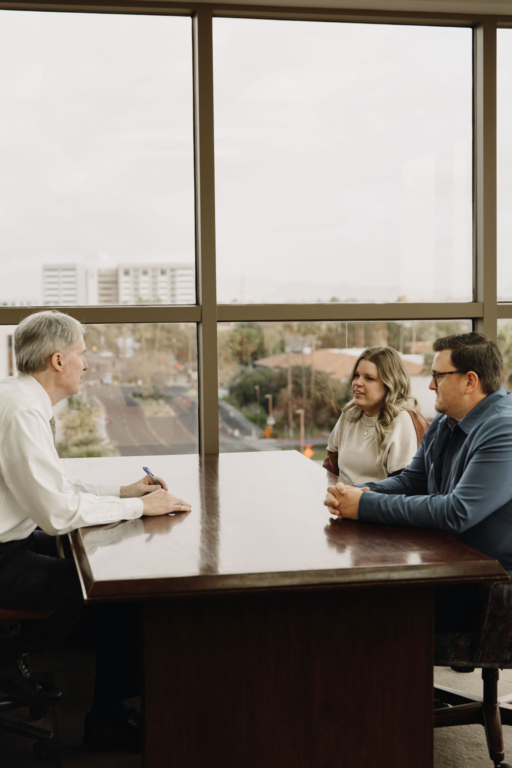 Rowley Chapman Barney attorneys reviewing a case with a client